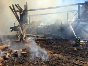 Firefighters fight spot fires at mill - Photo by Shady Grove Oliver/KSTK
