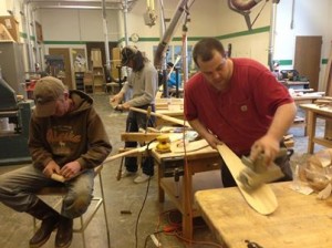 Paddle makers at the One People Canoe Society workshop - Photo by Shady Grove Oliver/KSTK