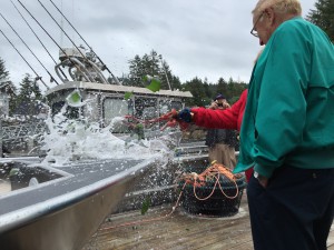 Nancy Murkowski christens the Rainbow. (Aaron Bolton, KSTK News)