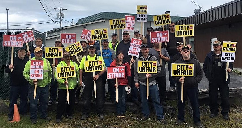 Wrangell municipal employyes represented by the International Brotherhood of Electrical Workers pose on the picket line June 22, 2017. (Photo courtesy IBEW )