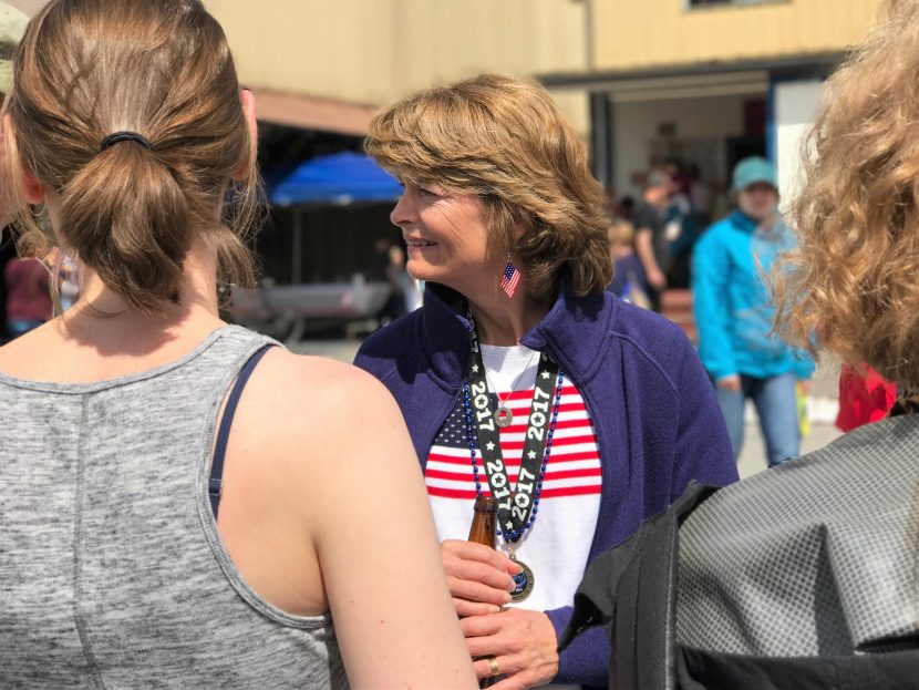 Sen. Lisa Murkowski talks to constituents during the Fourth of July celebration in Wrangell. (Photo courtesy Julia O'Malley)