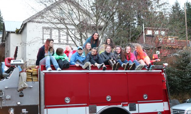Wrangell’s volleyball team celebrates a near victory and new record