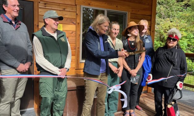 Sen. Murkowski cuts the ribbon at Anan Bay Cabin