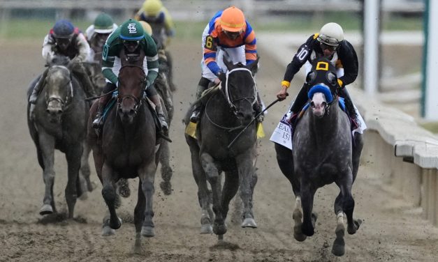 Napoleon Solo holds off Iron Honor to win the Preakness